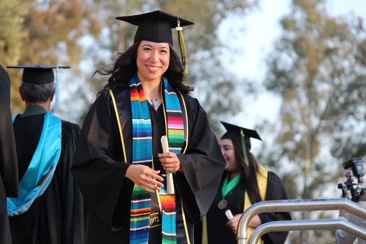 A college graduate in cap and gown