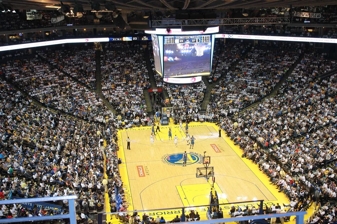 A packed basketball arena during a game